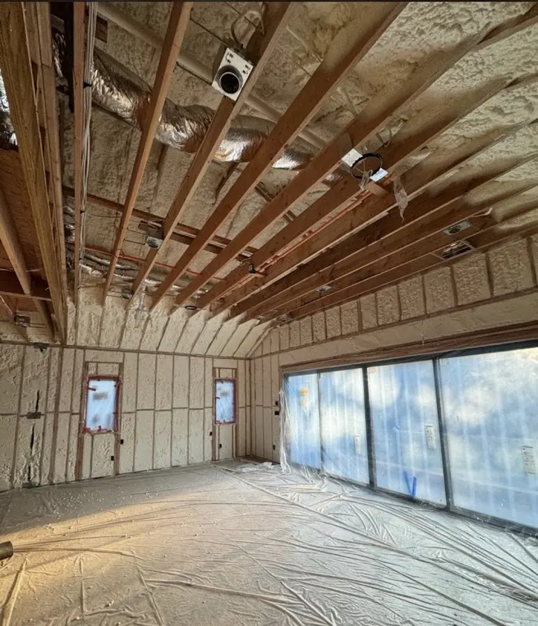 Interior walls and ceiling insulated with spray foam during new construction in Fort Hunt